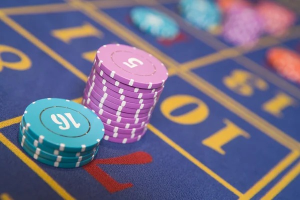 nnael live Baccarat table with real dealer and multi-camera feed showing card play